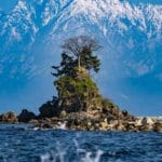 A Photo Series Captures a Magnificent Rock Formation Set Against the Tateyama Mountains